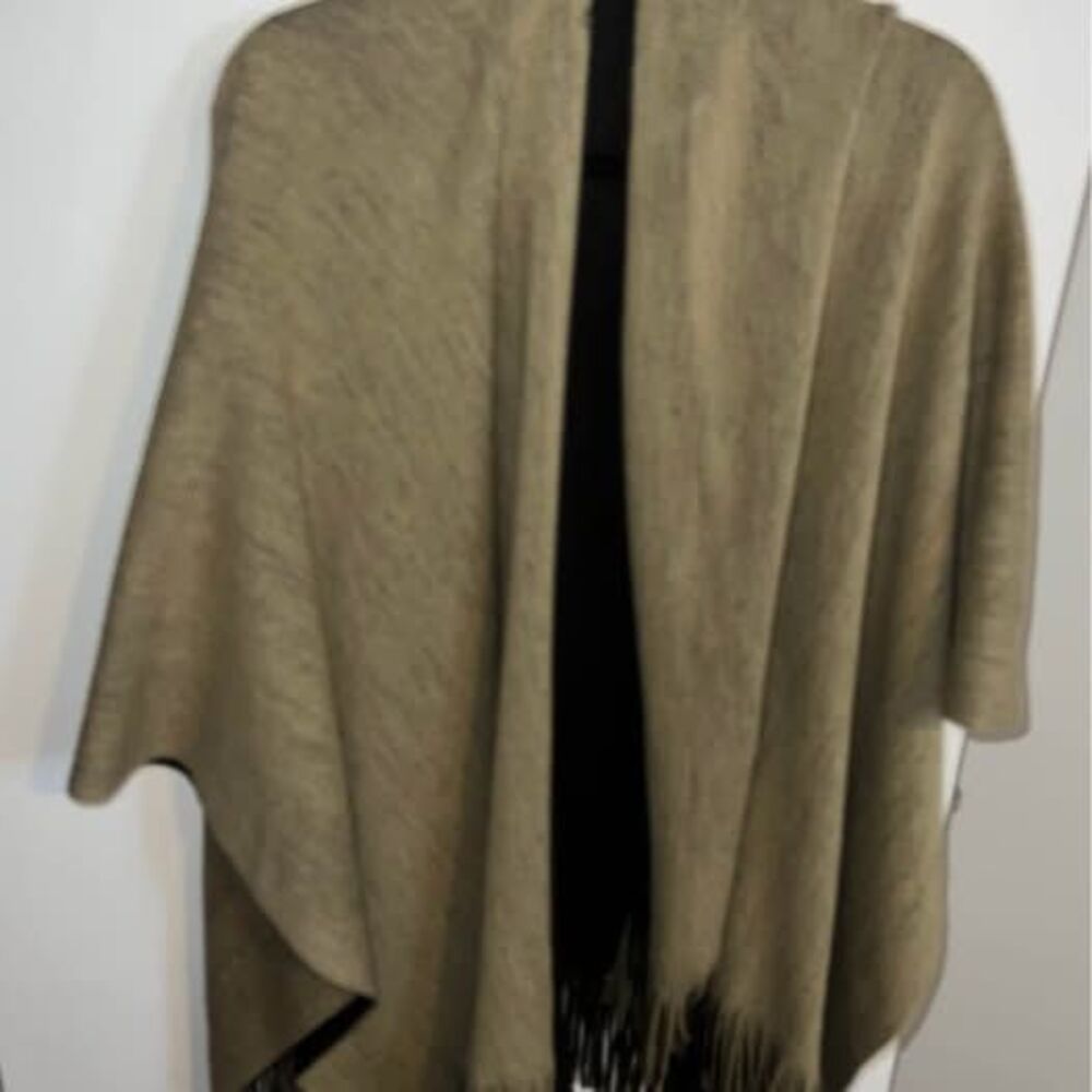 Brown knitted shawl with fringe